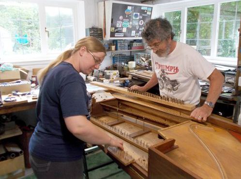 Square piano restorers at work